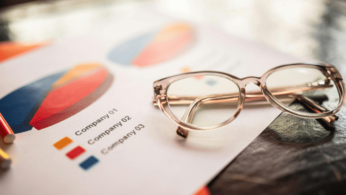 Documents showing two pie charts and results being compared 